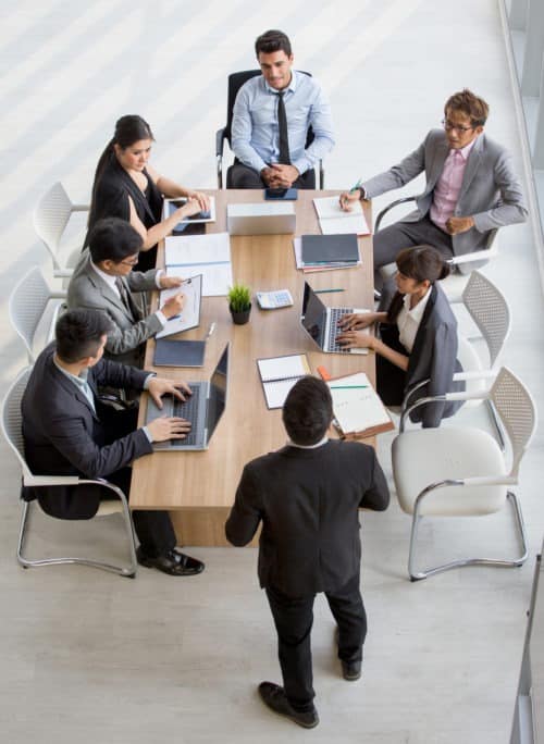 Group of business People Meeting Conference in office . marketing team Brainstorming Teamwork together at workspace.Discussion Corporate coworkers discussing Financial . multi-ethnic. High angle view