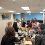 Silverliners packing care kits for Scott Mission in Toronto