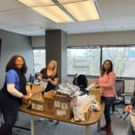 Silverliners packing care kits for Scott Mission in Toronto